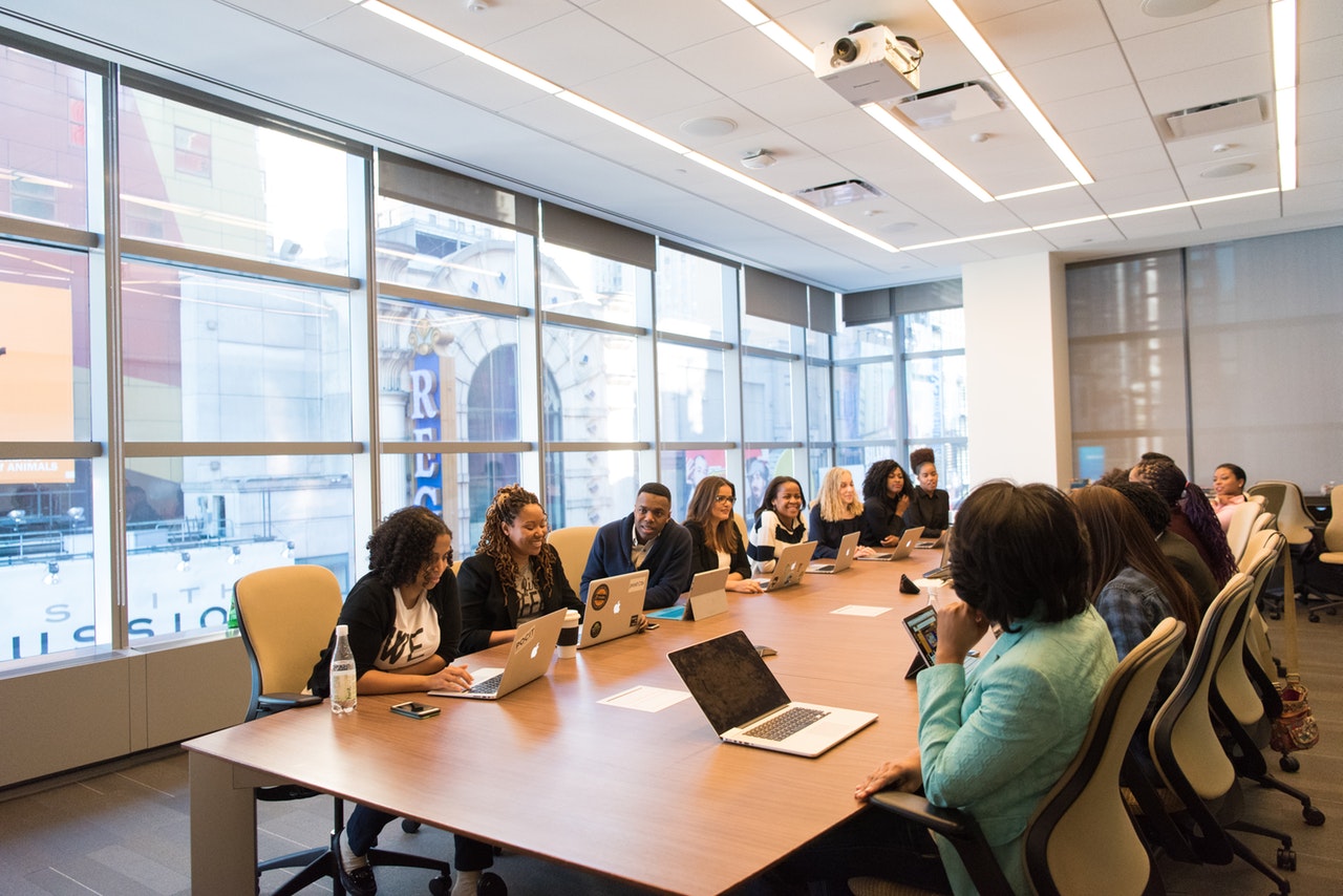 Office Meeting at Conference Desk, Why Indoor Air Quality Is Important